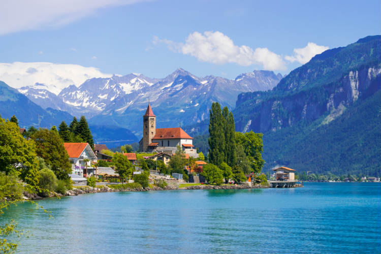 Panoramic view to the Brienz town on lake Brienz by Interlaken, Switzerland. 