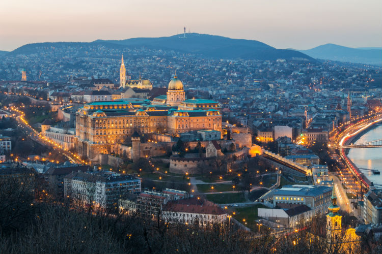 The Vienna skyline lit up from above