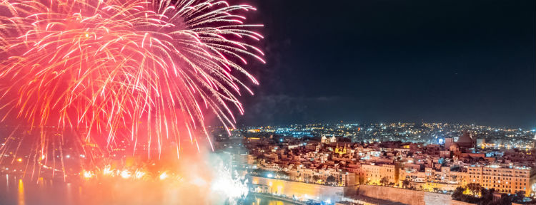 Fireworks at night above the city of Valletta in Malta