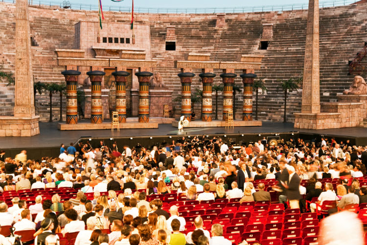 An opera show taking place in the Arena of Verona