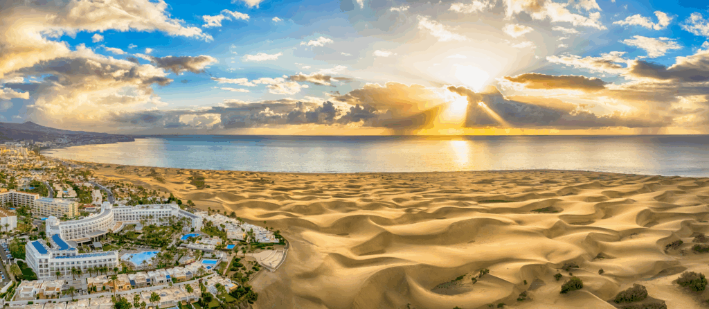 Landscape with Maspalomas town and golden sand dunes at sunrise, Gran Canaria, Canary Islands, Spain